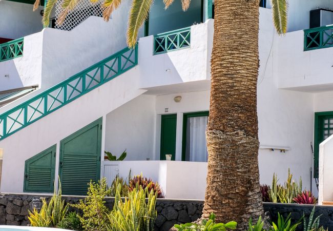 Apartamento en Puerto del Carmen - Chez Carmen - Coqueta y moderna casa con vistas al mar, piscina y WIFI con fibra