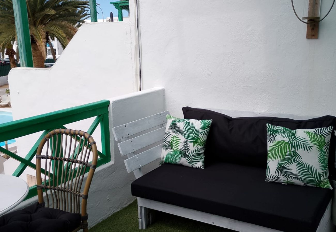 Apartamento en Puerto del Carmen - Chez Carmen - Coqueta y moderna casa con vistas al mar, piscina y WIFI con fibra