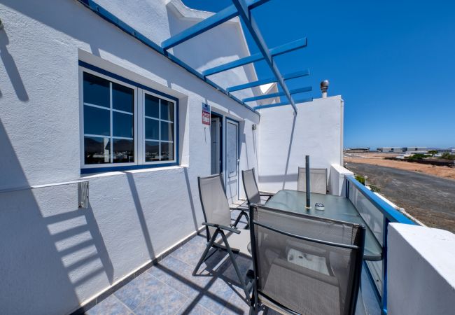 Casa en Playa Blanca - Bonitas Vistas, wifi rápido y balcón 