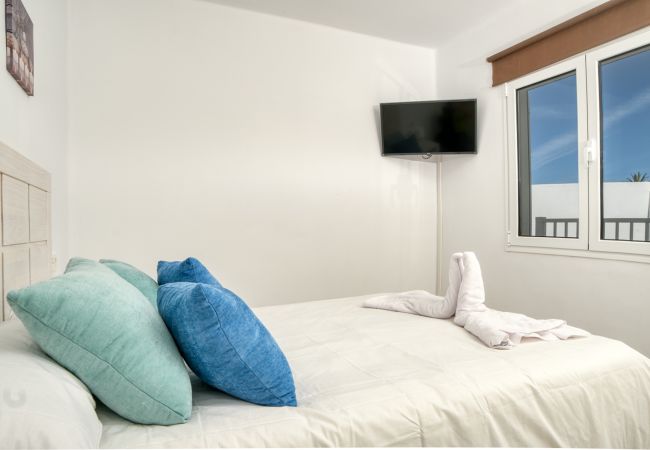 Ferienhaus in Costa Teguise - Suite ANIAGUA Helle FerienWohnung mit Poolblick