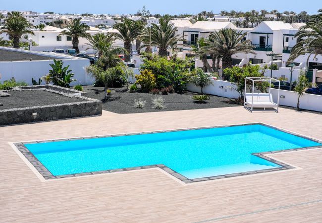 Ferienhaus in Costa Teguise - Suite ANIAGUA Helle FerienWohnung mit Poolblick