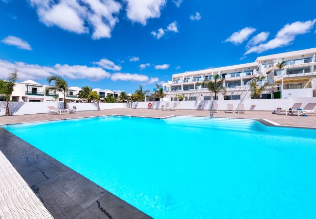 Ferienhaus in Costa Teguise - Suite ANIAGUA Helle FerienWohnung mit Poolblick