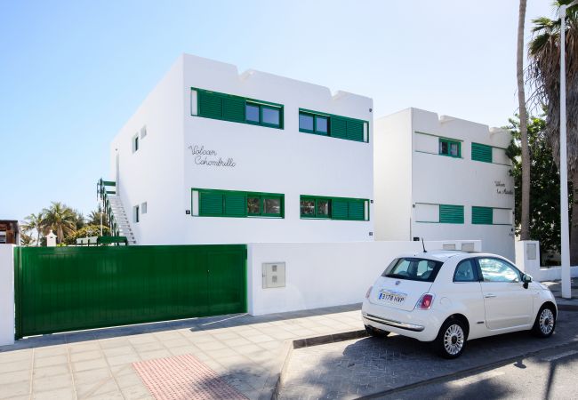 House in Puerto del Carmen - Red Volcano - 00 m from the beach-access to the fariones sports centre included (swimming pool, sauna, gym)