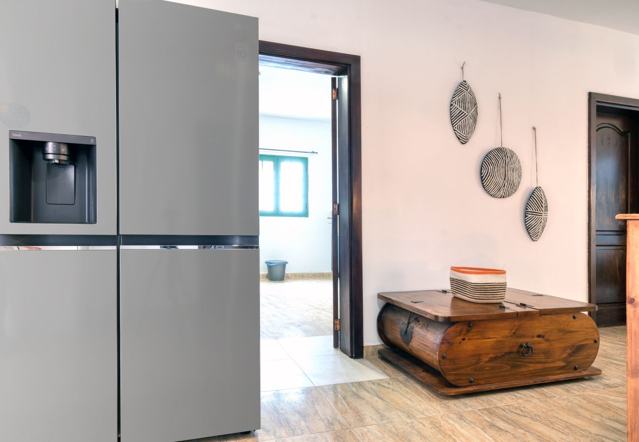 Chambres d'hôtes à Tinajo - Casa NoPasaNada: habitación La Palma con baño privado 