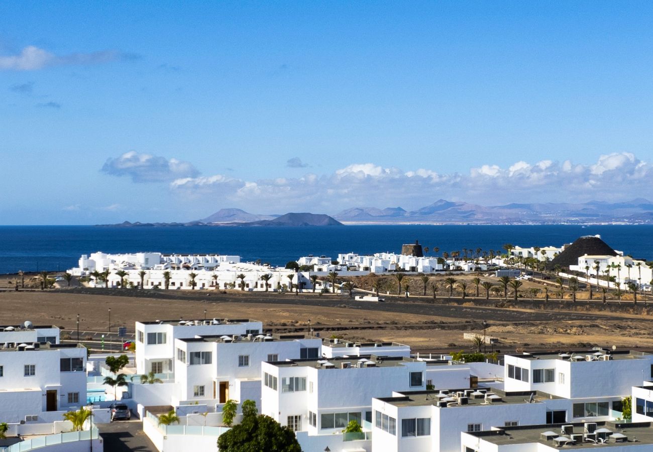 Huis in Playa Blanca - Marina Oasis-piscina, aire-acondicionado 